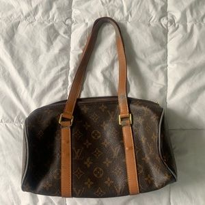 Severly used shoulder bag